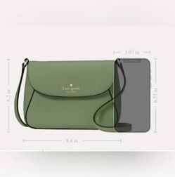 Kate spade small flip cross body bad new