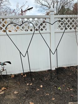 64”H cast iron heart shaped trellises have 2 available each is $55 apiece