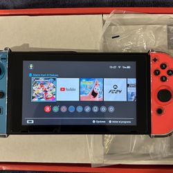 Nintendo SwitchTM con Joy-conTM Azul Neón y Rojo Neón