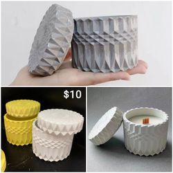 Candles In Concrete Vessles