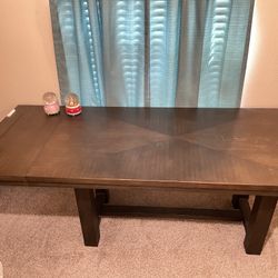 Ashley extendable dining table (seats  6-8)