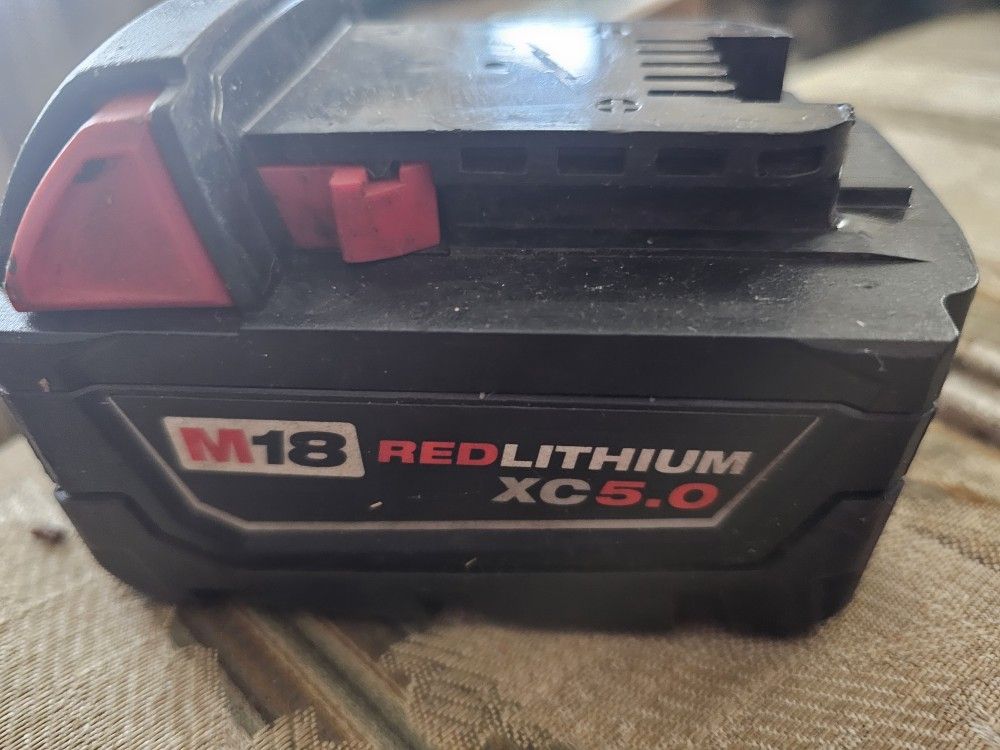 Milwaukee M18 XC 5.0Ah Red Lithium Battery 48-11-1850 18V ,GENIUNE Like New, FIRM , NO OFFER.