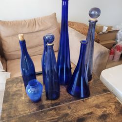Blue Glass Bottles And Vase