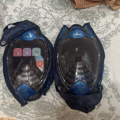 One New And One Used Snorkeling Mask