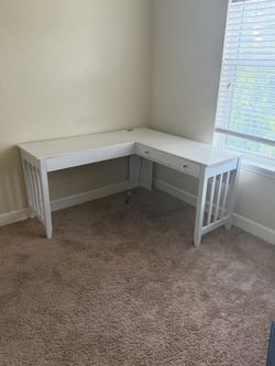 Lexicon Blanche Wood L Shaped Desk. One side is 59 inches the other 56 inches