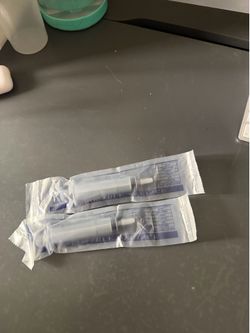 DISPOSABLE SYRINGE