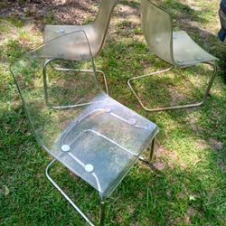 3 Clear Chairs
