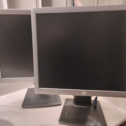 Two HP E190 I IPS Display Monitors.