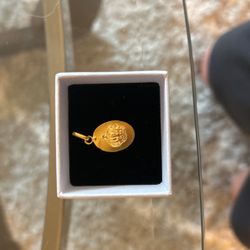 Gold pendant 19.2k Pickup or Will Ship At buyers risk