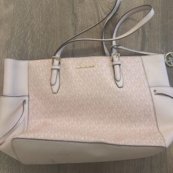 Michael Kors tote bag in a soft blush pink tone.