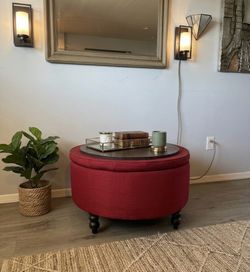 Upholstered round storage ottoman