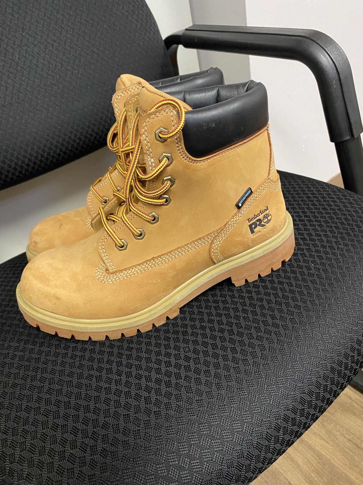 Women’s size 8, steel toe Timberland boots