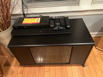 Black console with glass door