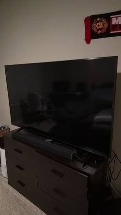 Large Flat Screen Samsung QLED TV with Vizio Sound Bar and Subwoofer