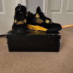 Yellow thunder Jordan 4’s 