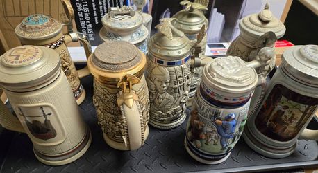 Lot of 9 Avon Steins collectable set of Stein excellent condition