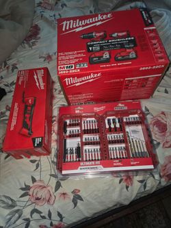 Milwaukee drill , multi tool, and drill bit set
