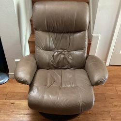 Swivel Rocking Chair Leather.( Brown.)  Dimensions are.  39” H— 35”W—-23”D.