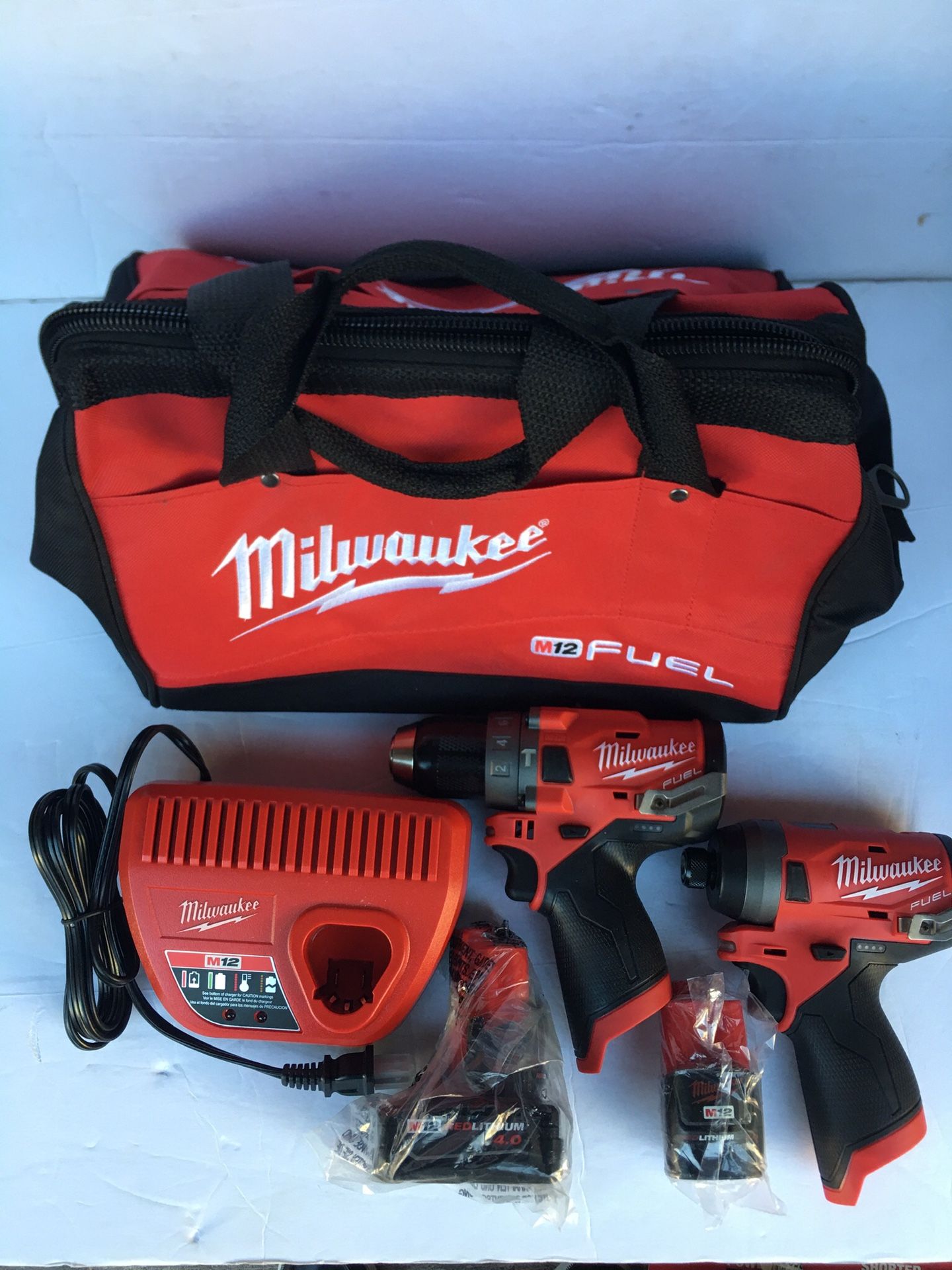 MILWAUKEE M12 FUEL HAMMER DRILL SET ( 2 batteries, Charger + carrying bag )