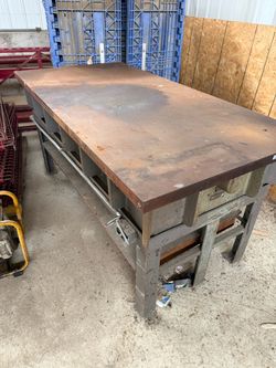 Solid thick steel work bench