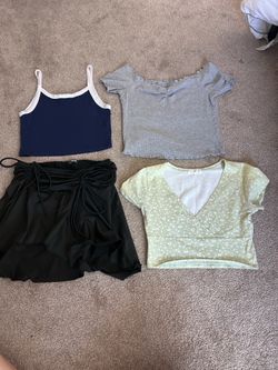 $5. girls clothes. they all fit like a small, fashion nova, brandy melville, tilly’s. black skirt, green low cut top, blue crop top & gray ruffled top