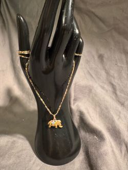Cha u & jewelled elephant charm