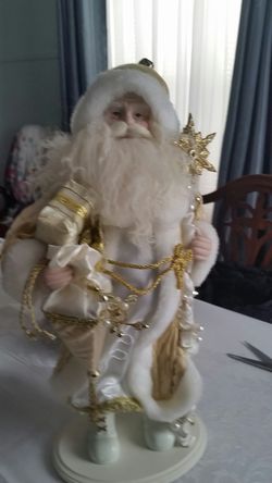 Santa on a wooden base.