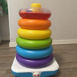 Fisher-Price Toddler Toy Giant Rock-A-Stack, 6 Stacking Rings with Roly-Poly Base