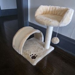 Cat chair, scratcher with toy ball.