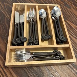 Vintage forged flatware set