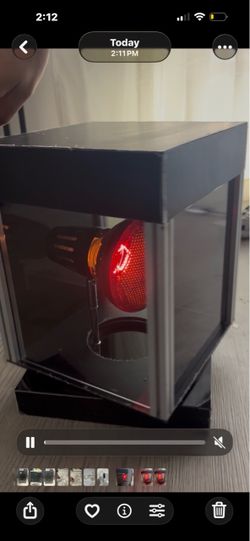 Rotatable solar film heat box display