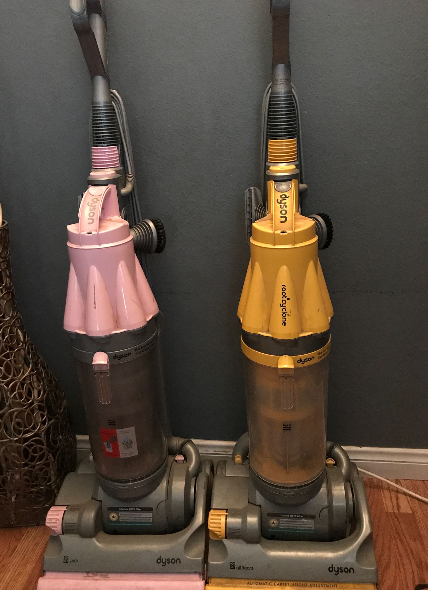 Two Dyson vacuums all they need is the band ...best offer