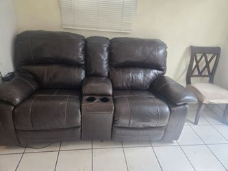 Recliner sofas, good condition. Needs staples on back, great shape
