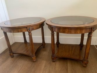 Pair of baker brothers oval burl wood and glass side tables