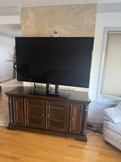 Ashley Furniture Key Town - Dark Brown Finish Tv Stand