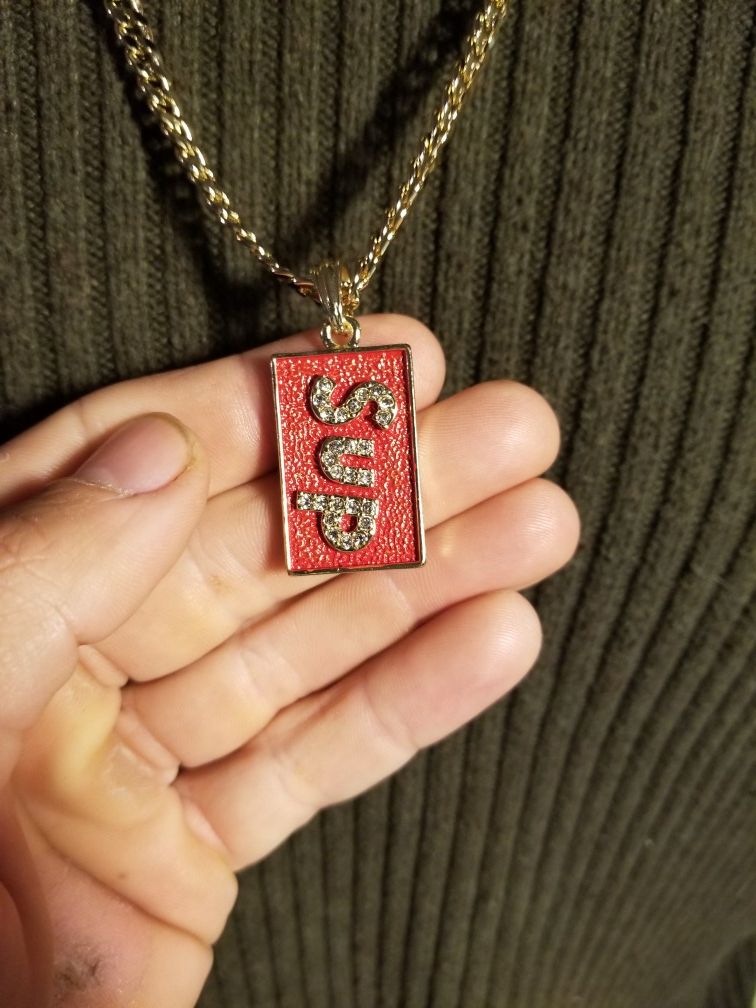 Supreme Pendant on 24' Cuban Chain.