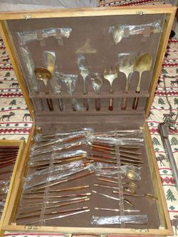 Jean Claude rosewood flatware eighty four pieces
