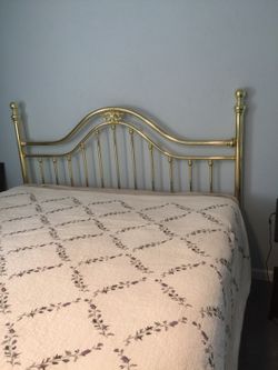 Brass headboard for king bed.