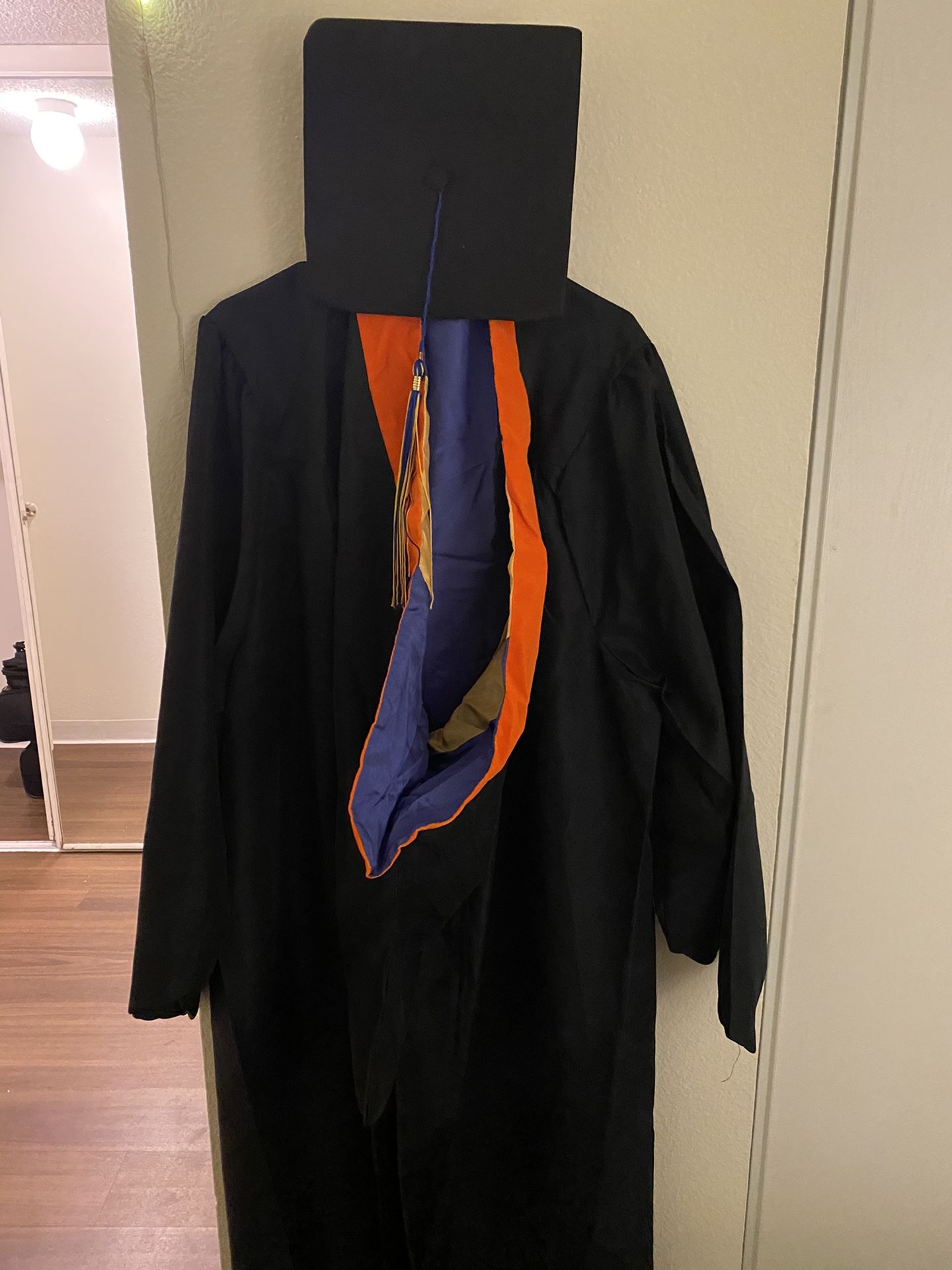 Graduation gown, hood and cap