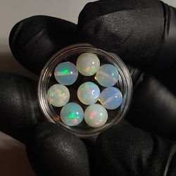 Eight Larger Size Ethiopian Opal Beads 
