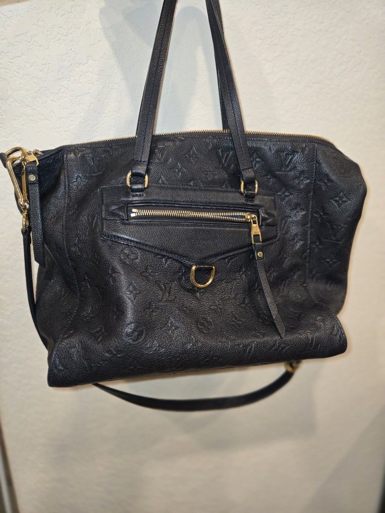 Louis Vuitton
Lumineuse leather handbag