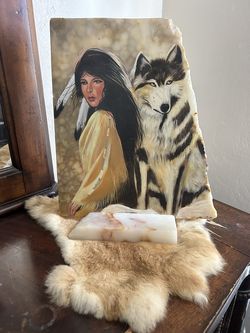 Lady with wolf stone decoration