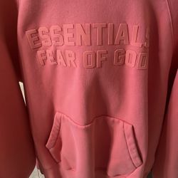 brand new fear of god essentials hoodie cole is Coral