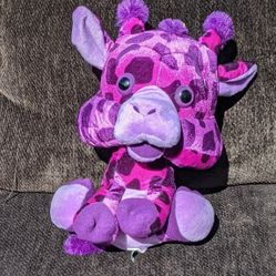Purple giraffe stuffed toy