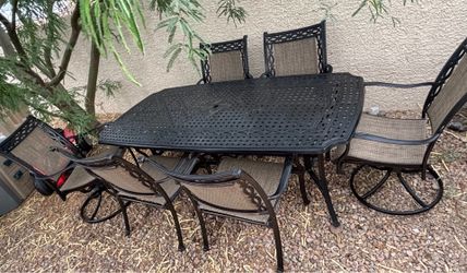 7-Piece Cast Aluminum Patio Outdoor Dining Set with Rectangular Table and Swivel Dining Chairs good condition very heavy table 800 OBO