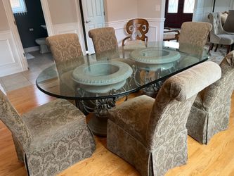 Glass oval dining table and 6 chairs