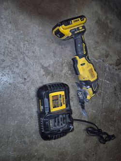 20 volts  Dewalt multitool for sale Works Strong firm Battery And Charger Include