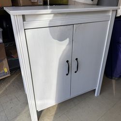 White IKEA Brusali 3 shelve cabinet