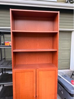 Book shelf and a round center table