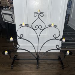 LARGE BLACK WROUGHT IRON 7 PILLAR CANDLE STAND